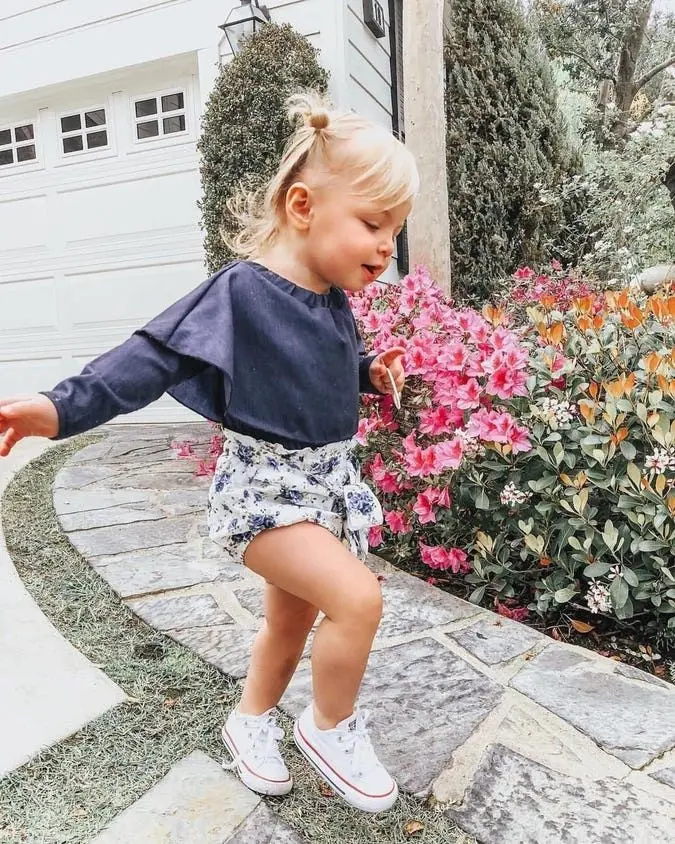 Beautiful Kid in Garden Photo in HD Quality
