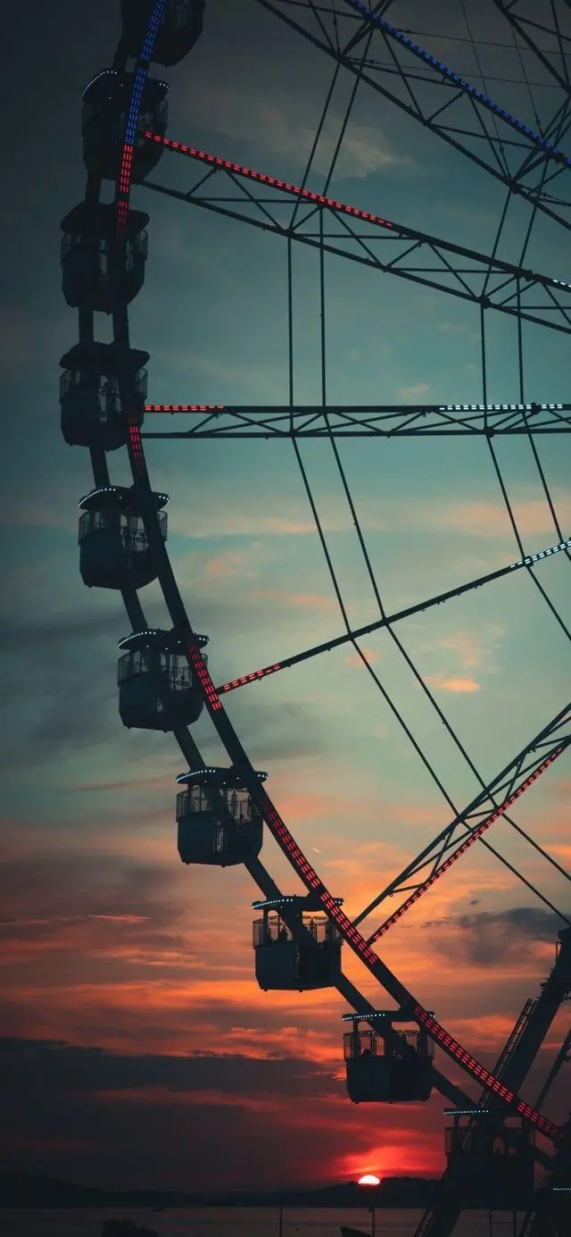 Download Ferris Wheel Background with Red Sunset