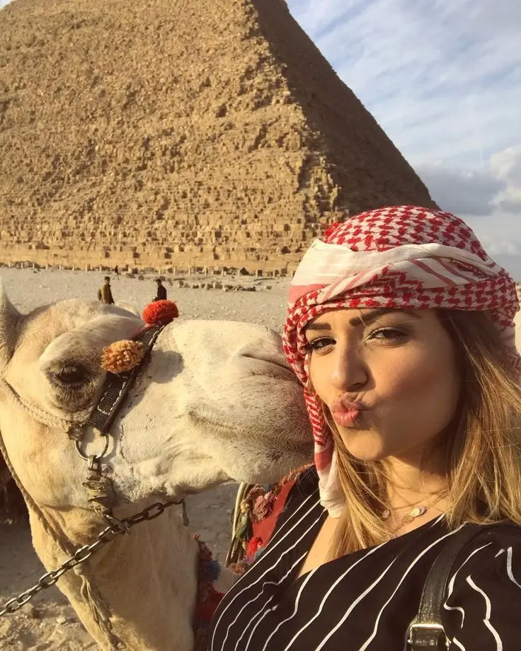 Download Camel Kissing Girl's Cheek Profile Picture