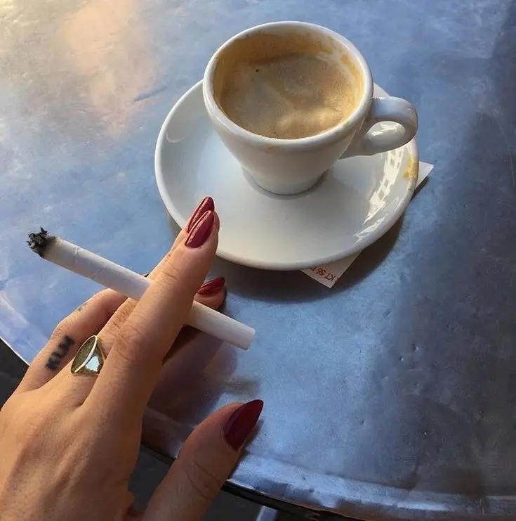 Download Image of Cigarette and Painted Fingers