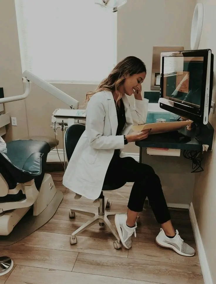 Female Doctor in White Coat Image