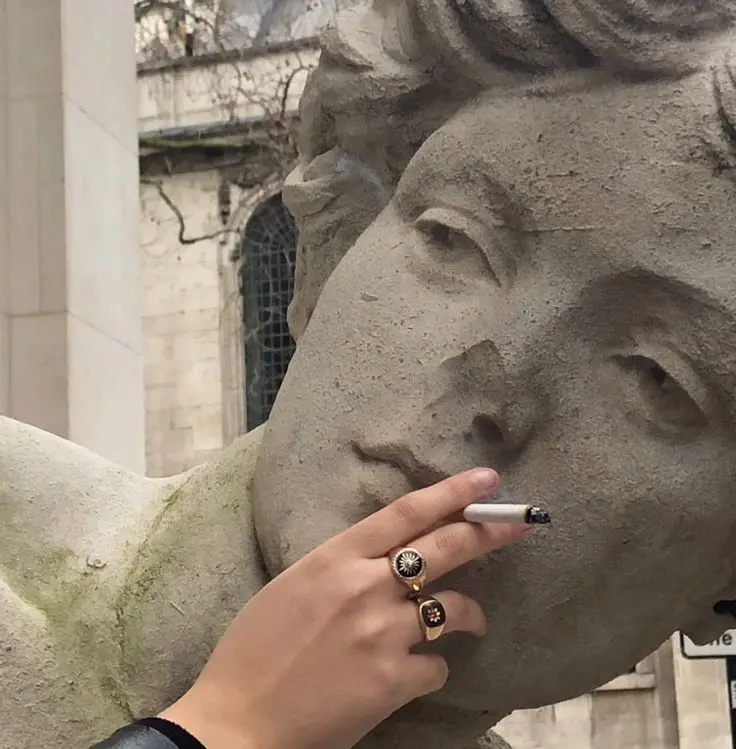 Download Image of Statue Smoking a Cigarette