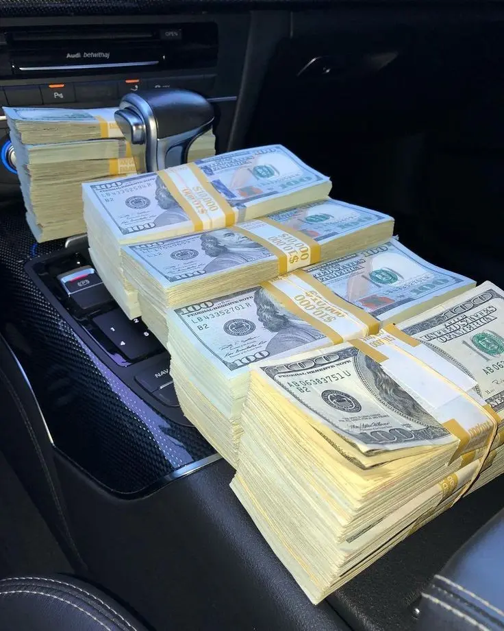 Download Image of US Dollars in a Car