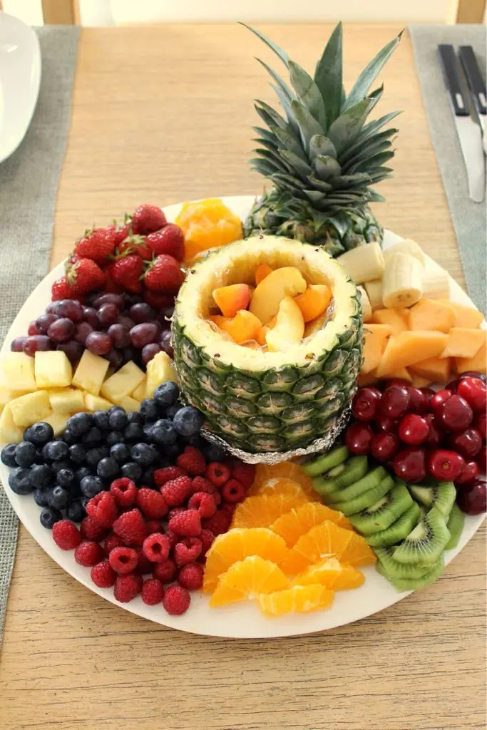 Image of Arranging Fruit in a Round Platter
