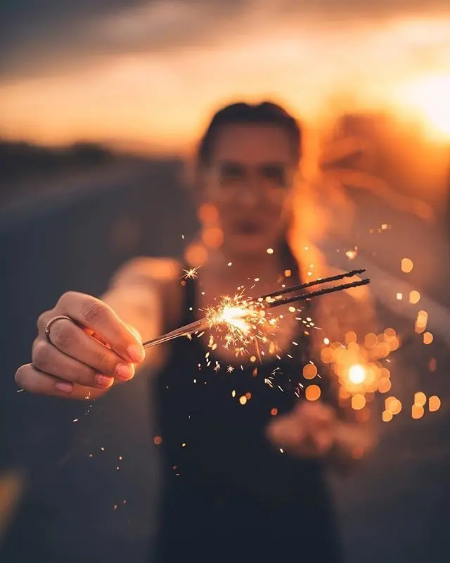 Download High-Quality Girl with Sparkler Wallpaper