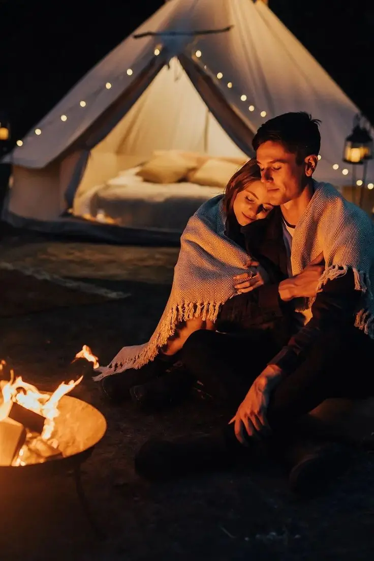 Romantic Couple Pose by the Fire
