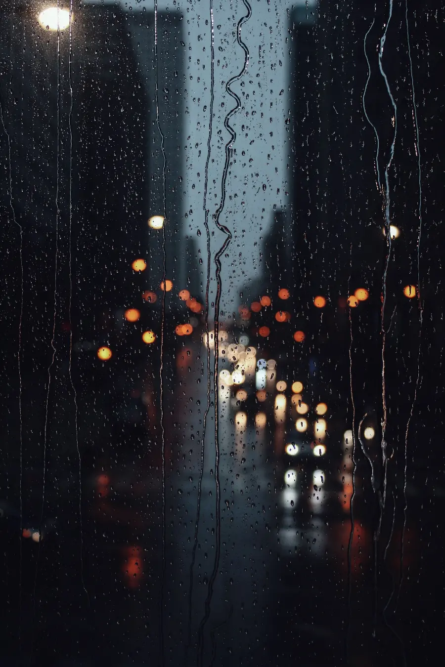 Beautiful Rainy Night Scene - Raindrops and Cozy Atmosphere