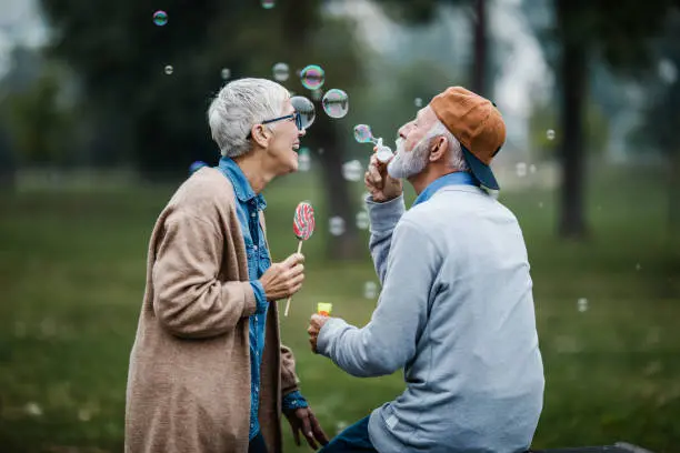 Download Image of an Old Man Making Bubbles
