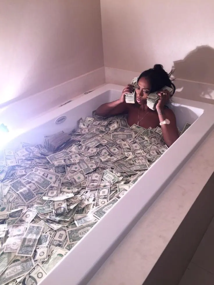 Download Background Image of Dollars in a Bathtub