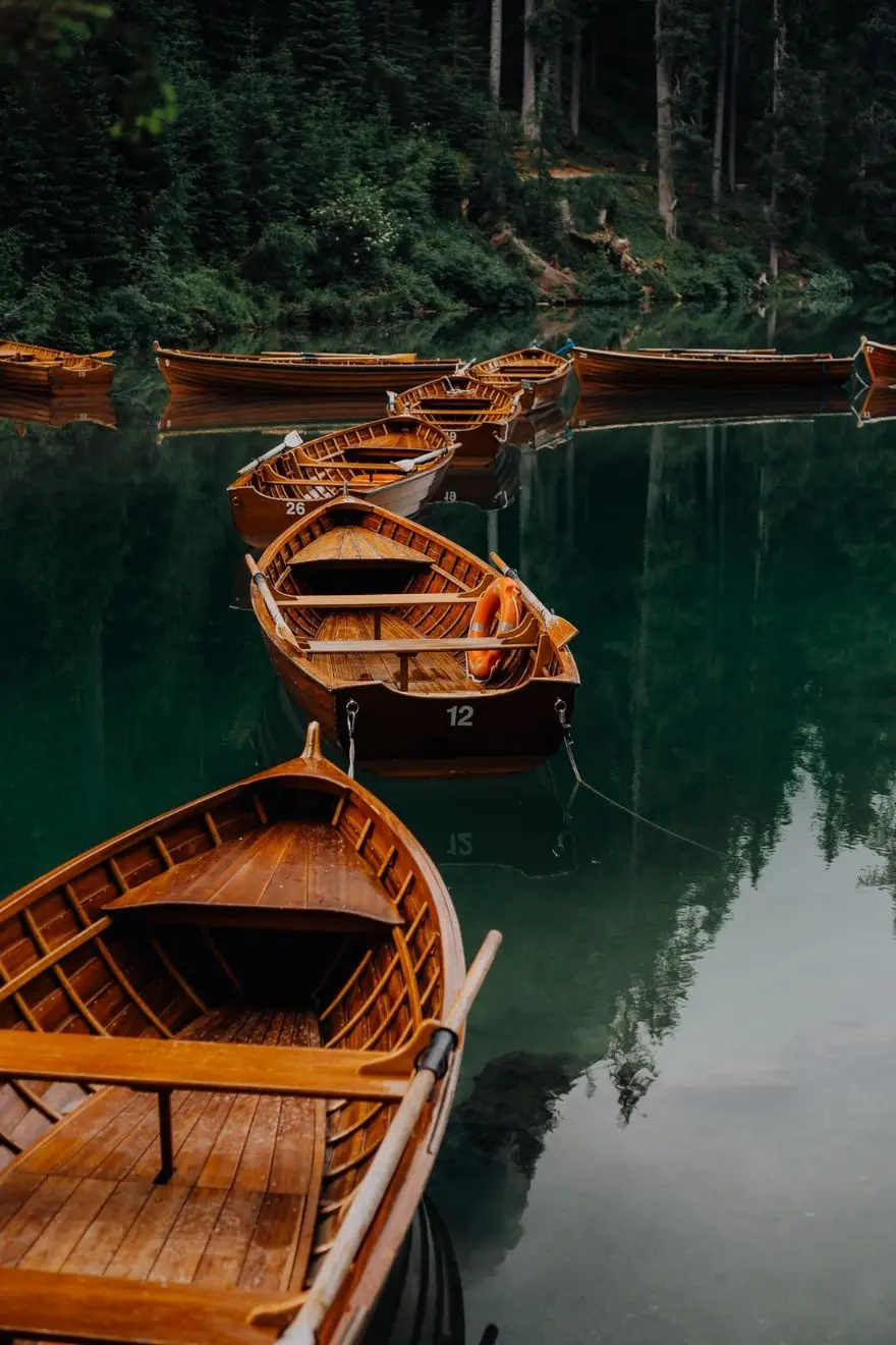 Vertical Boat and Ocean Wallpaper