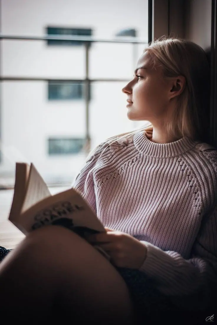 Distracted Girl Reading Book Image