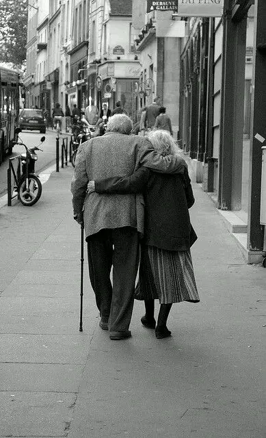 Image of Elderly Couple Walking on the Street