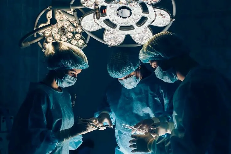 Surgeons at Work in Specialized Attire