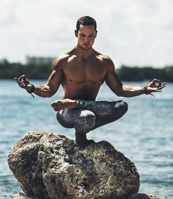 Download Yoga on Rock in Middle of Sea Wallpaper