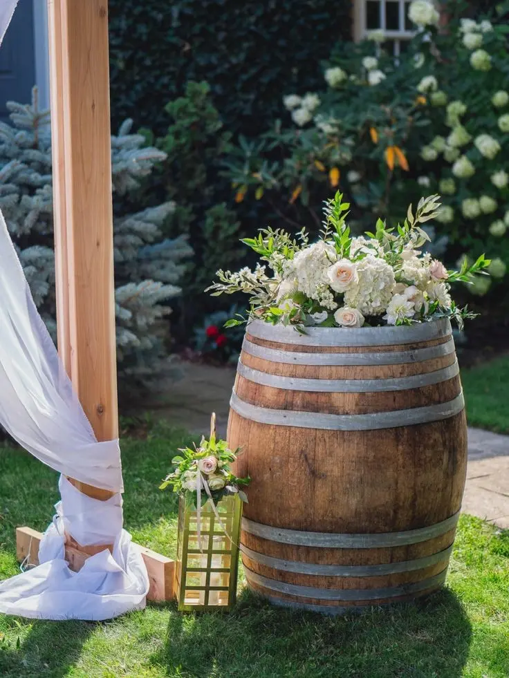 Download Image of White Flowers in Wooden Barrel