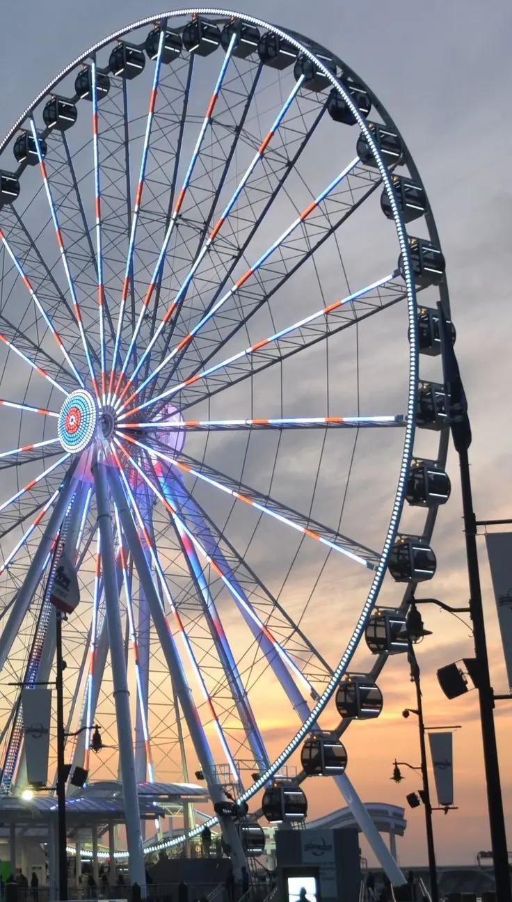 Download Ferris Wheel Background with Yellow Sunset