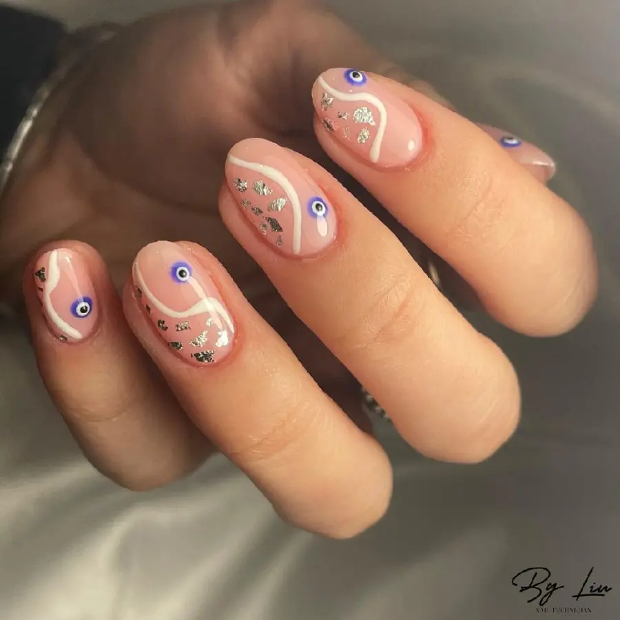 Evil Eye French Nail Design for a Protective Look