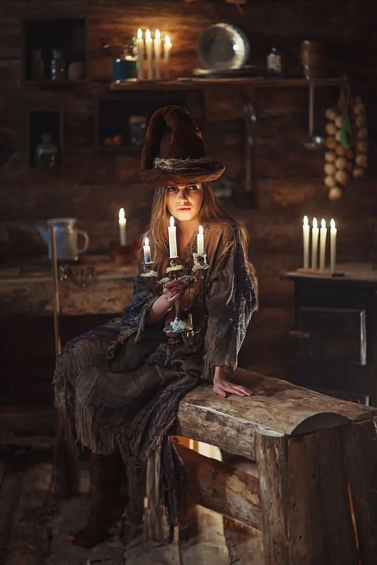 Download Profile Picture of a Witch with a Candle in a Wooden Cabin