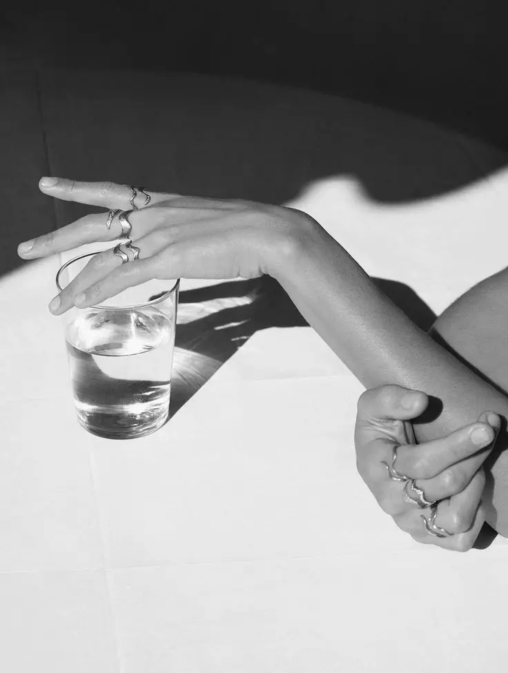 Download Profile Picture of a Hand Holding a Glass of Water