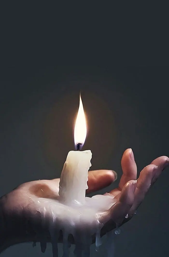 Download Melted Simple Candle in Hand Image