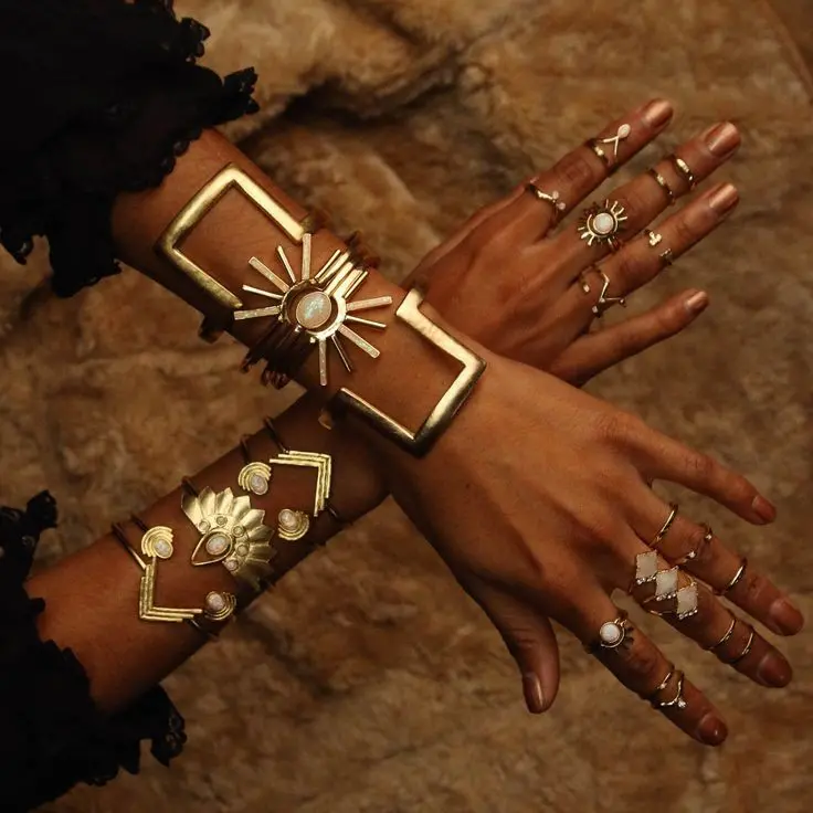 Download Images of Tanned Girl's Hand with Gold Bracelet