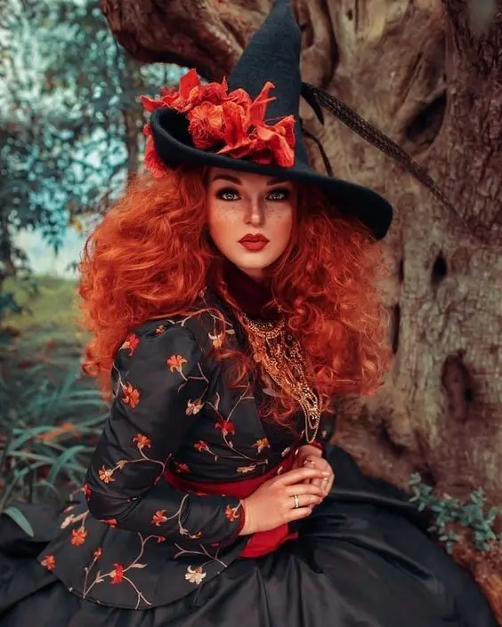 Download Profile Picture of a Red-Haired Witch with Heavy Makeup