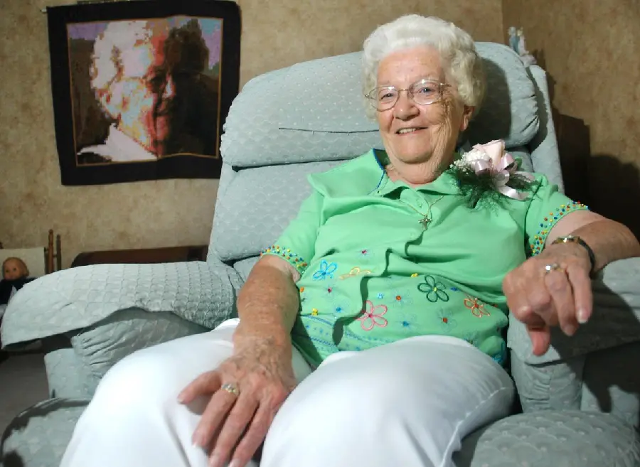 Image of a Happy and Cheerful Elderly Woman with Glasses