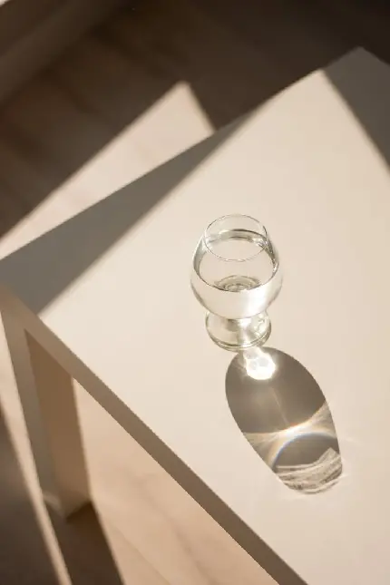 Download Wallpaper of a Glass of Water in the Sun