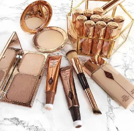 Download Image of Golden and Shiny Cosmetics for Makeup Inspiration