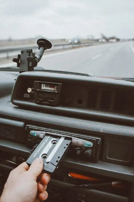 Download High-Quality Profile Picture of Cassette Tape in Car