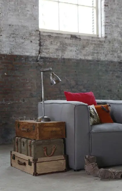 Download HD Image of Suitcase Next to Sofa