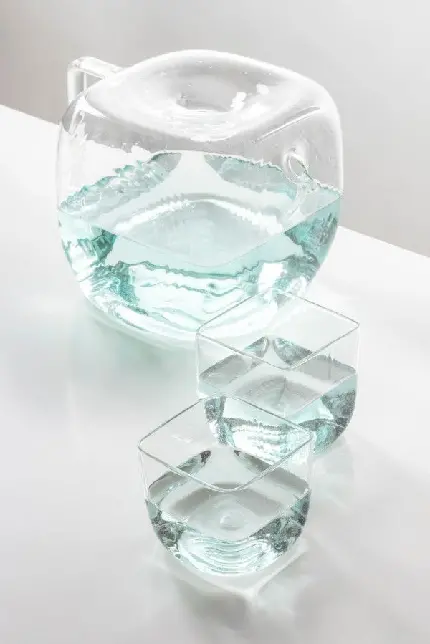 Download Background of a Water Pitcher and Two Glasses