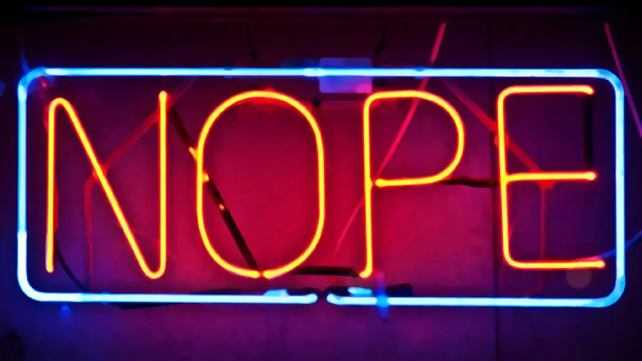 Download Photo of Neon sign with the title nope for desktop 