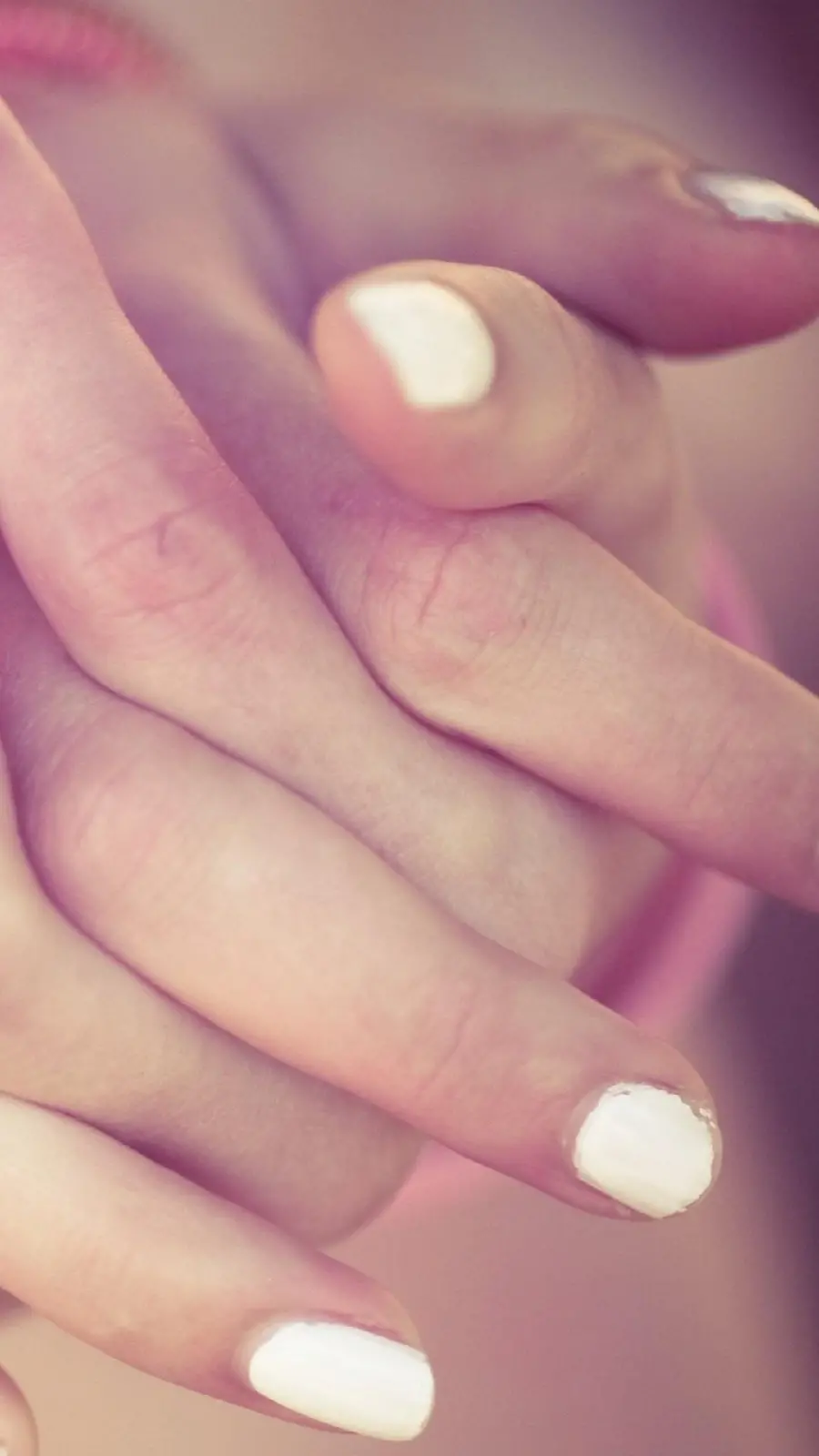Download stock photo of a love knot made of human hands 