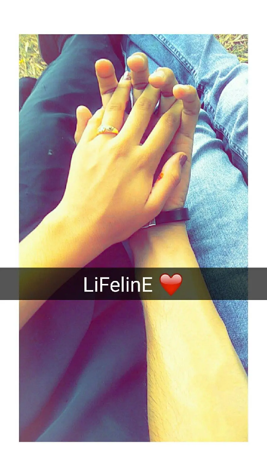 A picture of a couple holding hands in a relationship