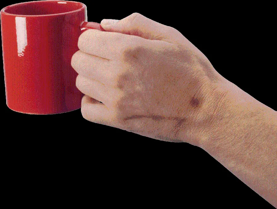 Image of red cup in human hand