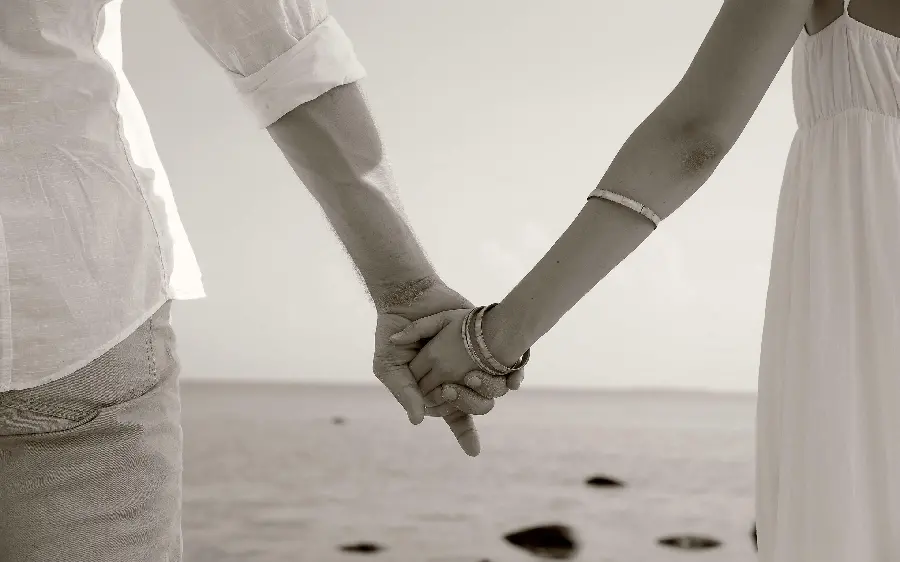 Hands of love that have been intertwined for years, never separate, young couples' profiles 