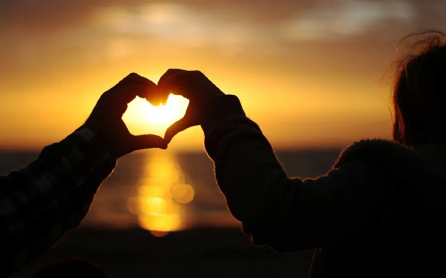 Beautiful sunset wallpaper and background with a beautiful couple