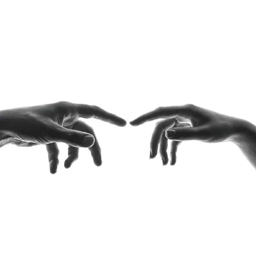 Photo of black hands reaching out for wallpaper and background