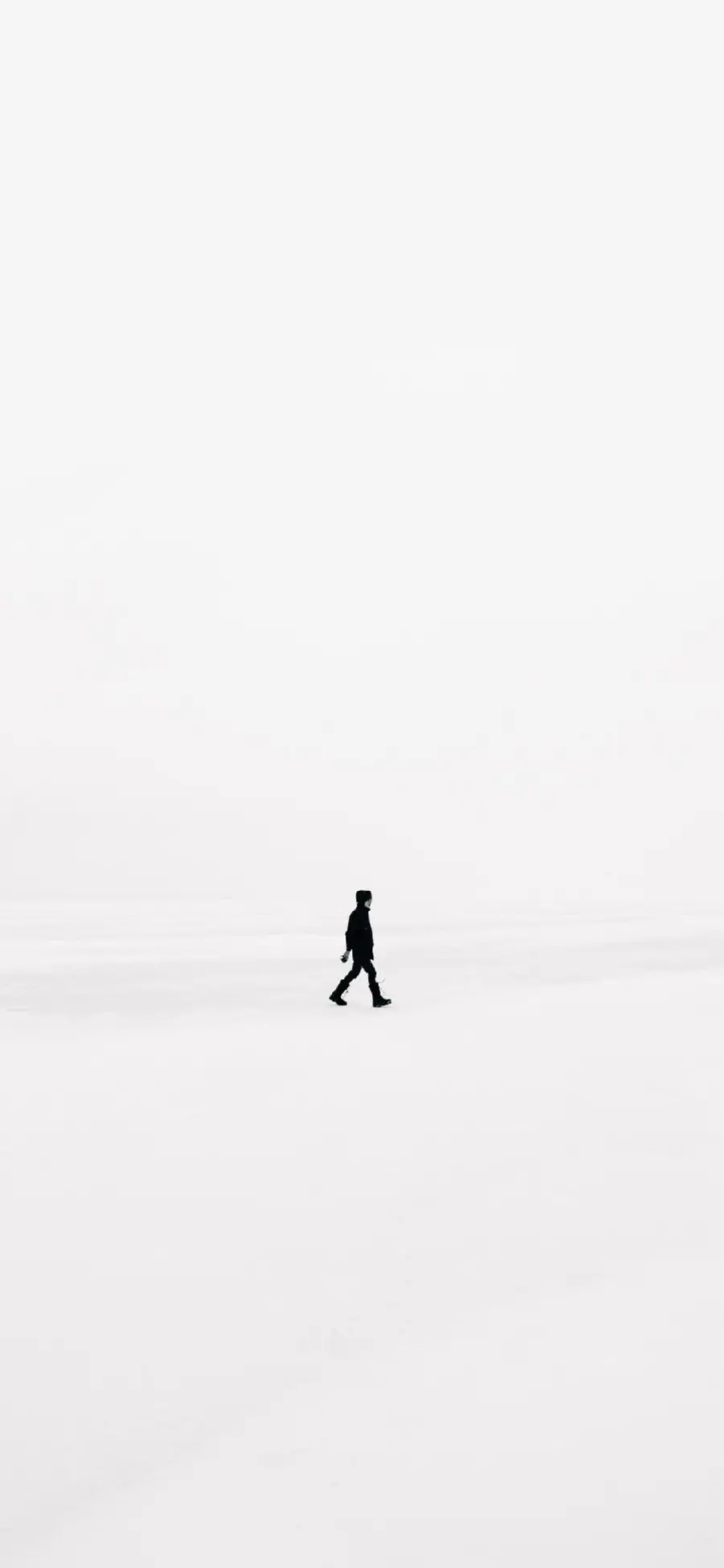 An image of a lonely man in the snow for wallpapers and profiles and for special people