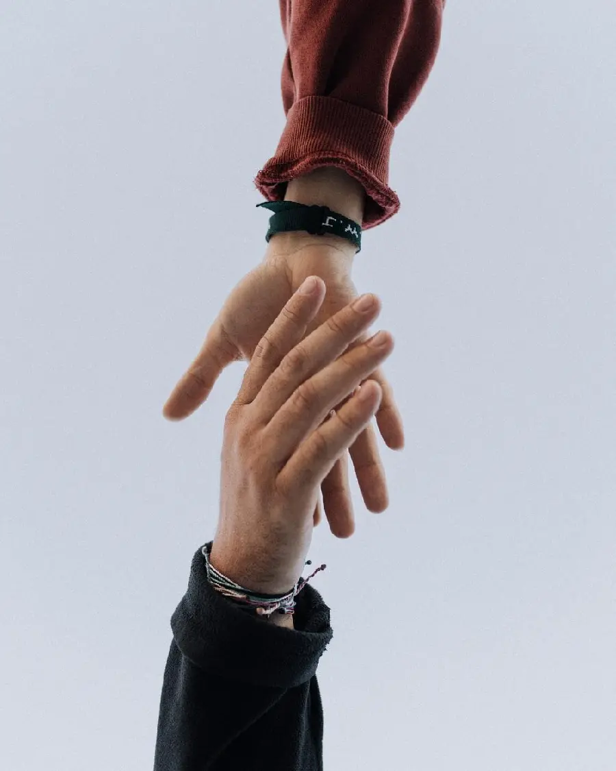 Friendly picture of loyal friends holding hands for profiles and dating