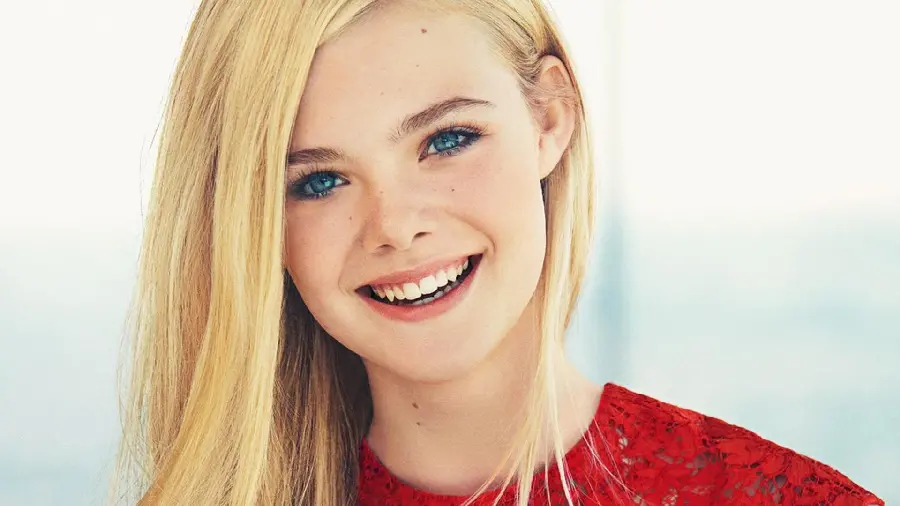 Elle Fanning in red dress and beautiful smile