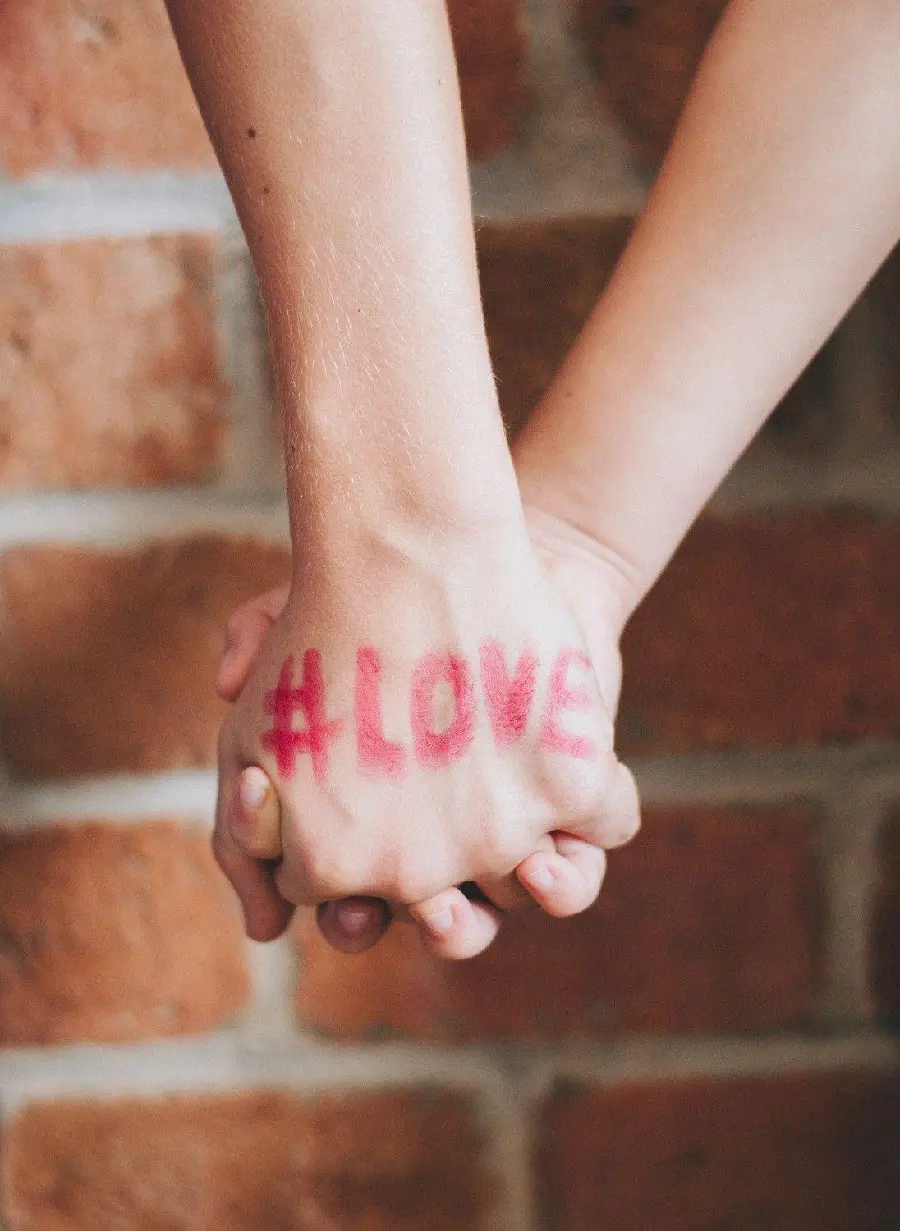 Hands of love holding a lover together for wallpaper and background