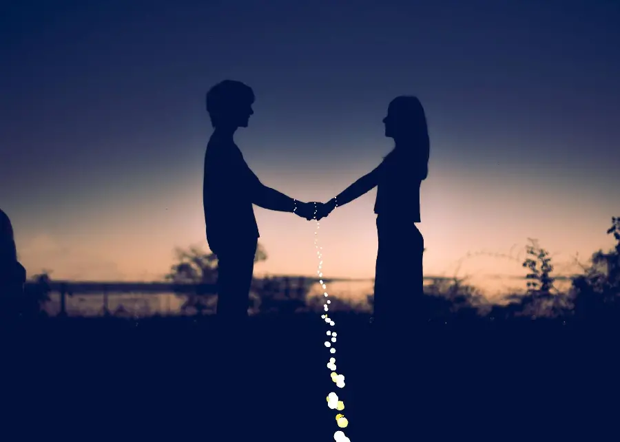 A picture of a beautiful couple at sunset for the wallpaper of these reels