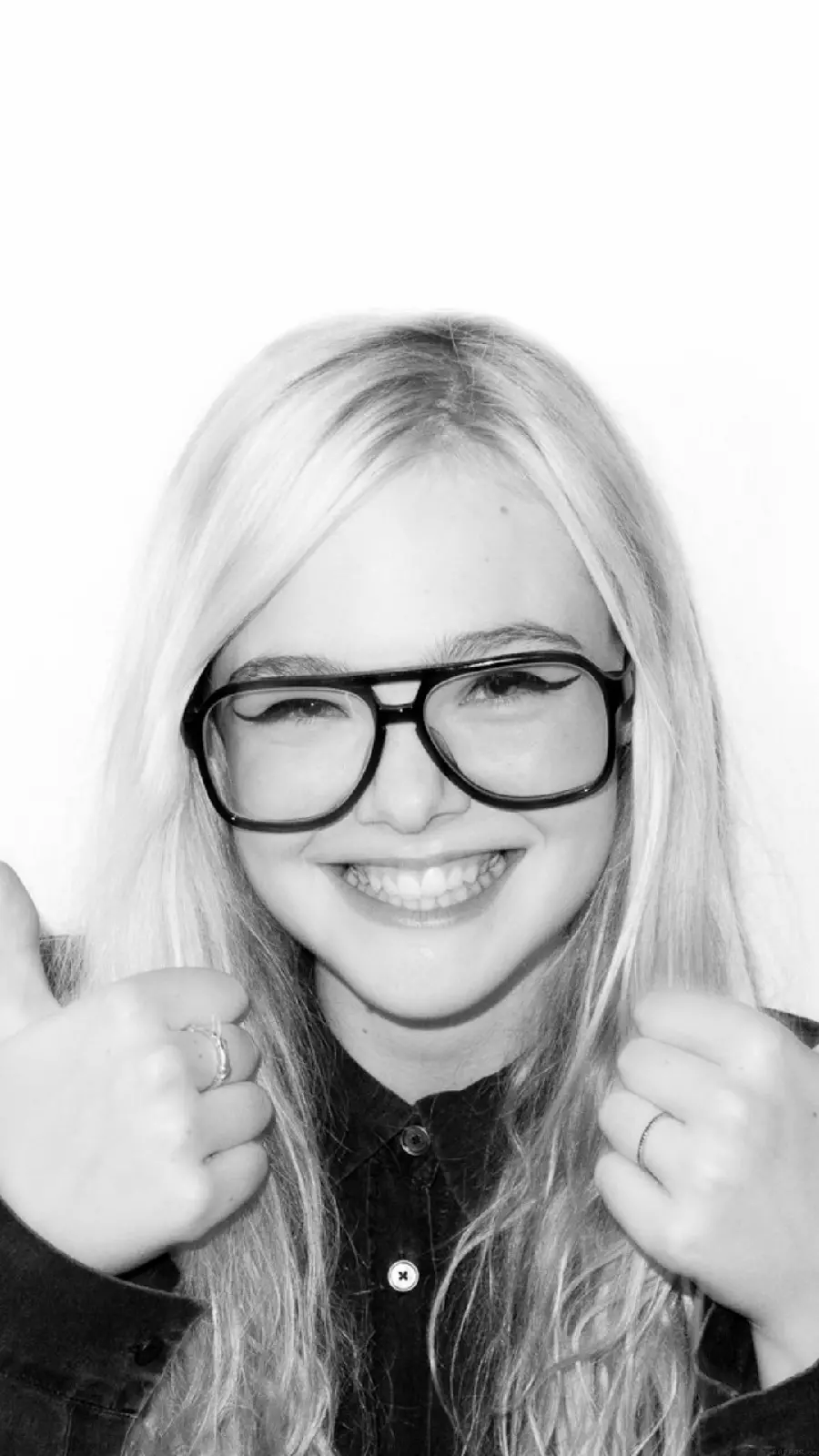 Black and White Photo of Elle Fanning with Big Glasses