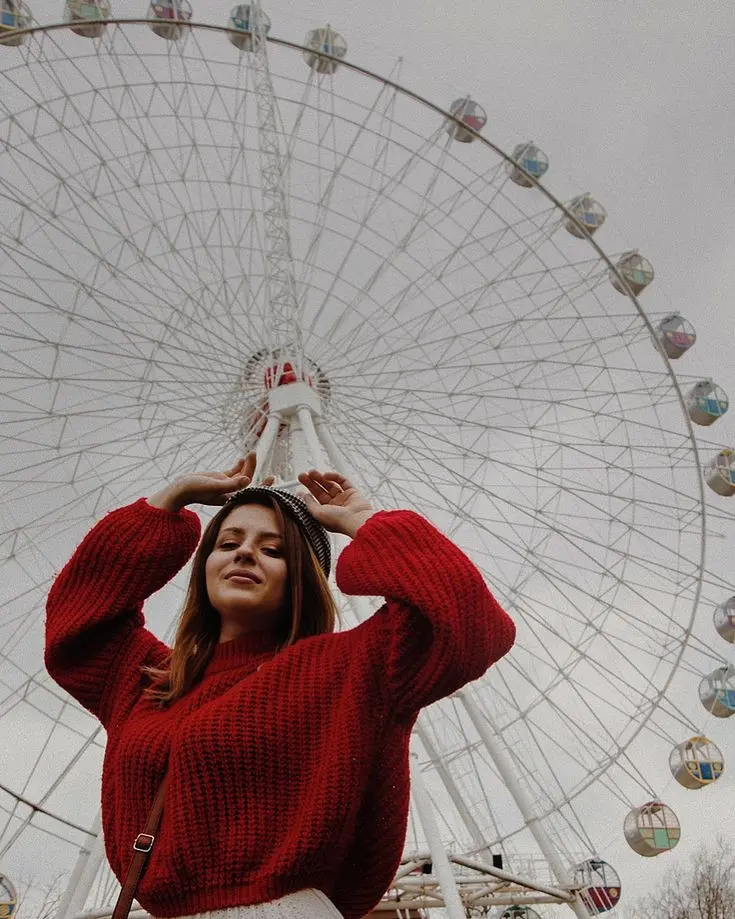 Creative girl with Ferris wheel artistic pose profile picture