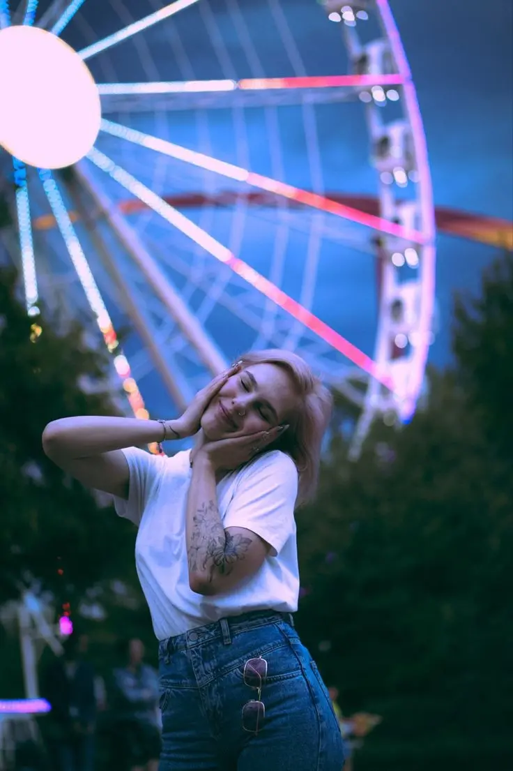Trendy girl posing with Ferris wheel high quality profile picture
