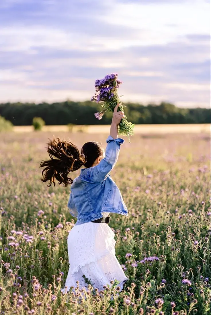 HD profile picture of girl in beautiful green flower field