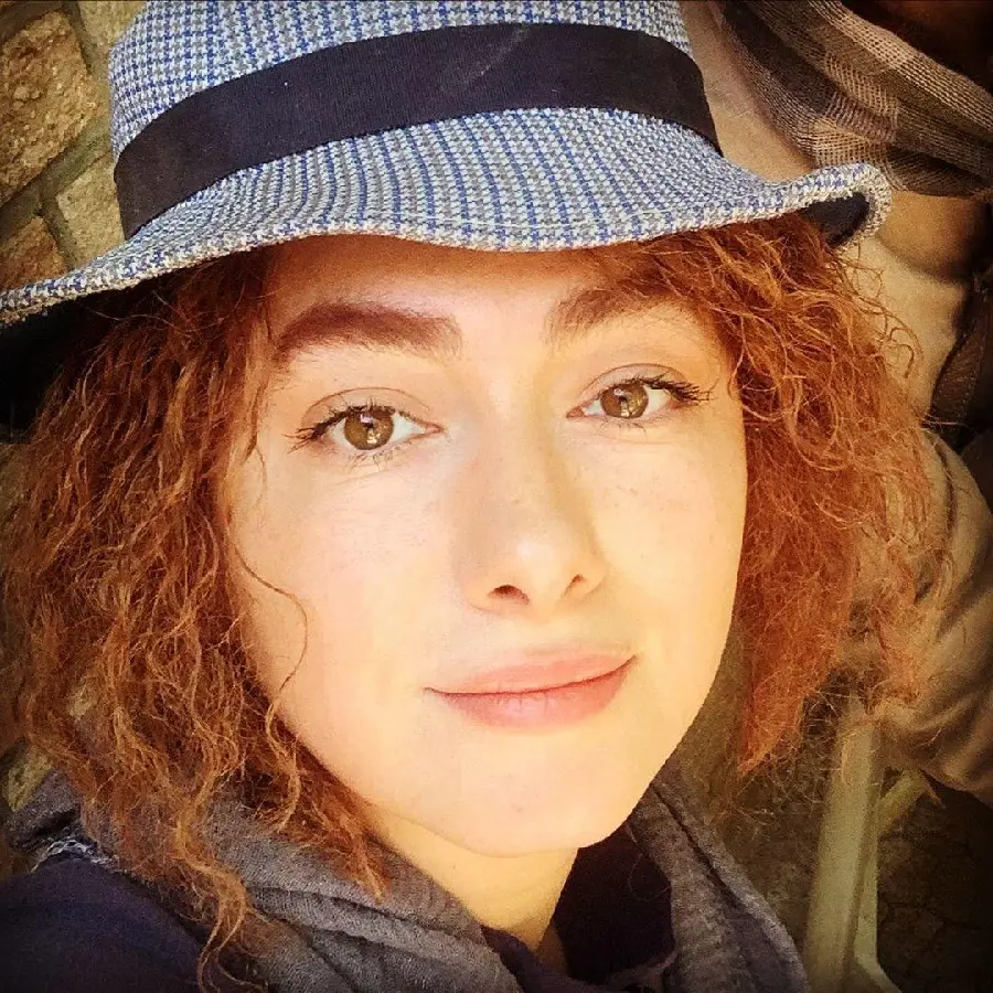 Hanieh Tavassoli With Curly Hair And Hat Stylish Look