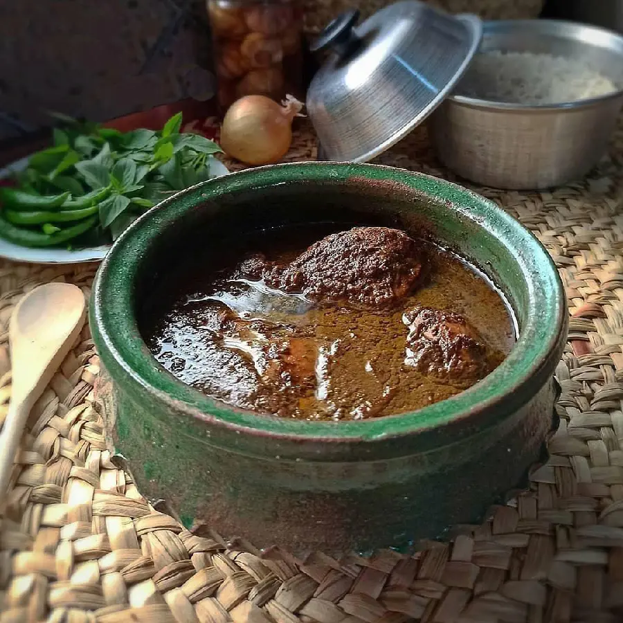 Fesenjan pomegranate walnut stew Persian food photo